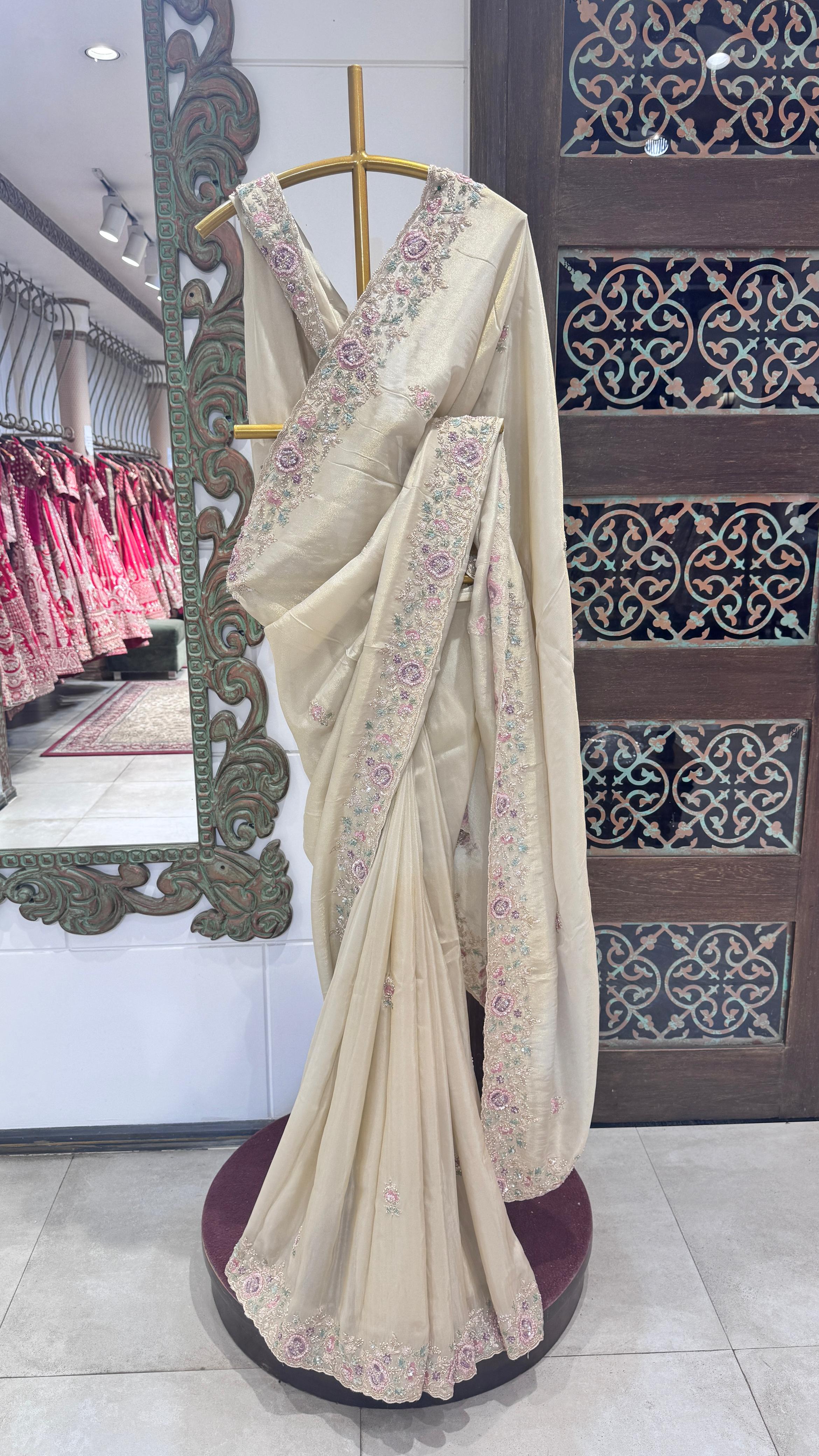Ivory color saree with floral border