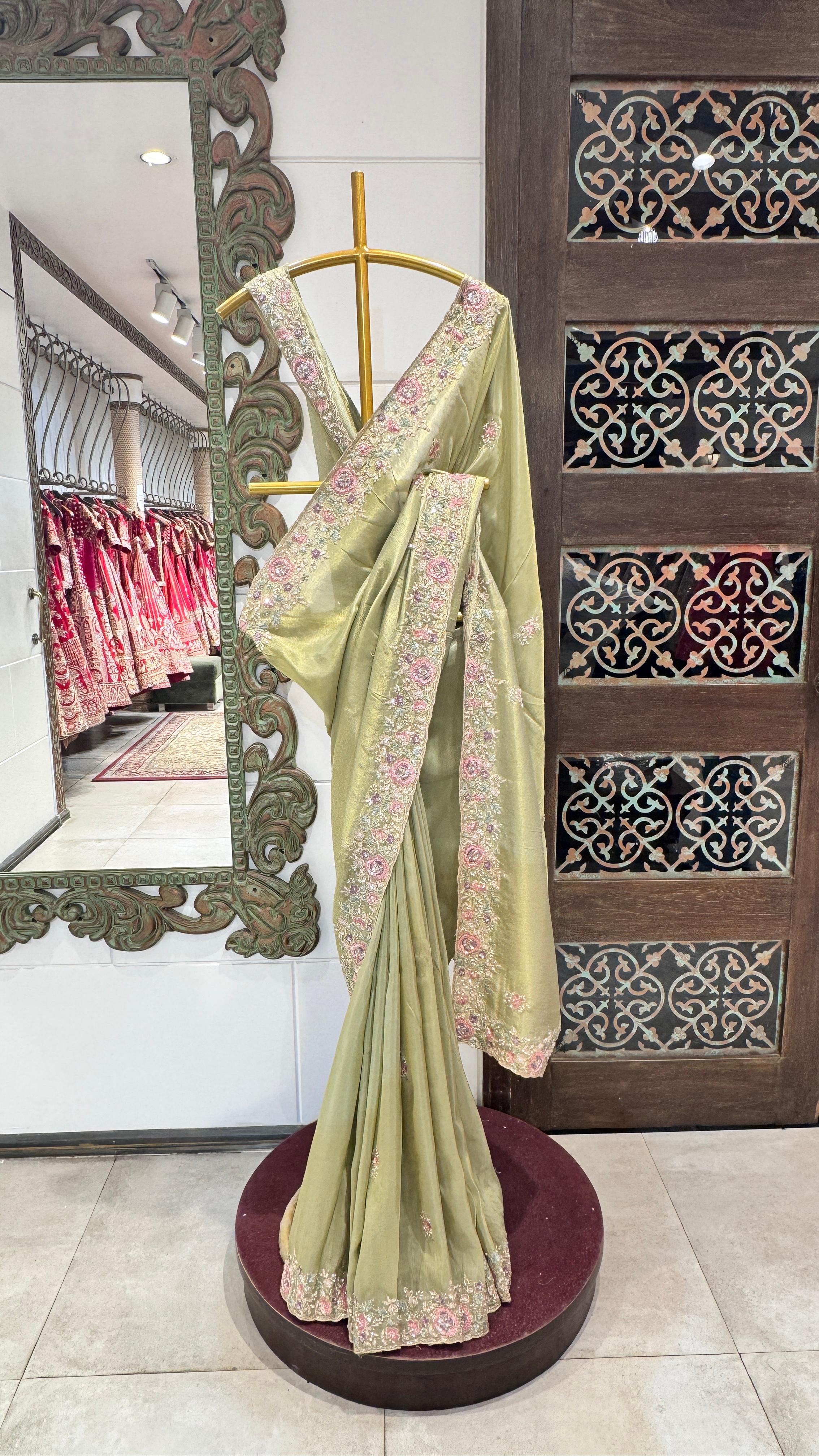 Green saree with floral border