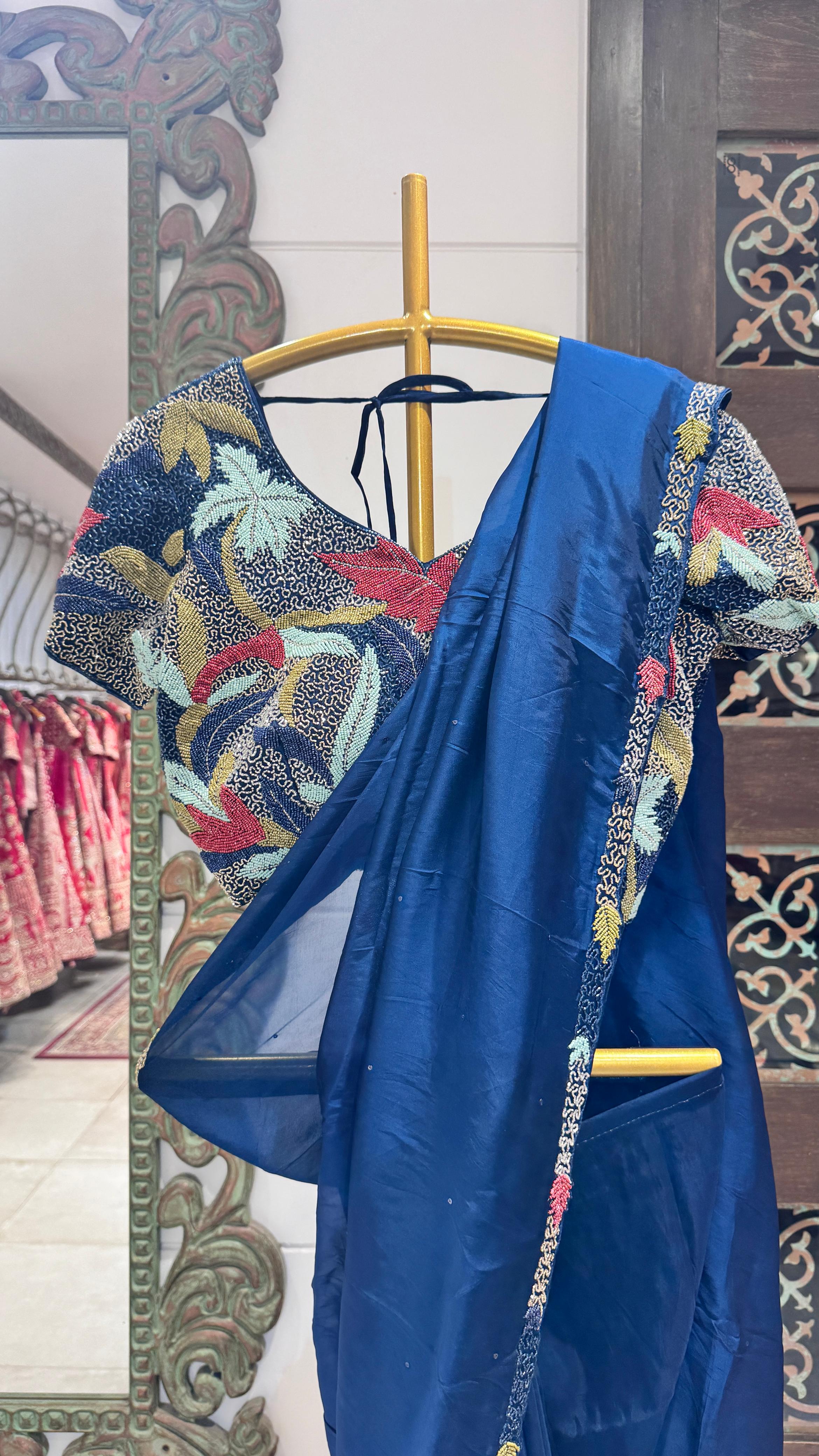 Teel blue color saree with sequience border