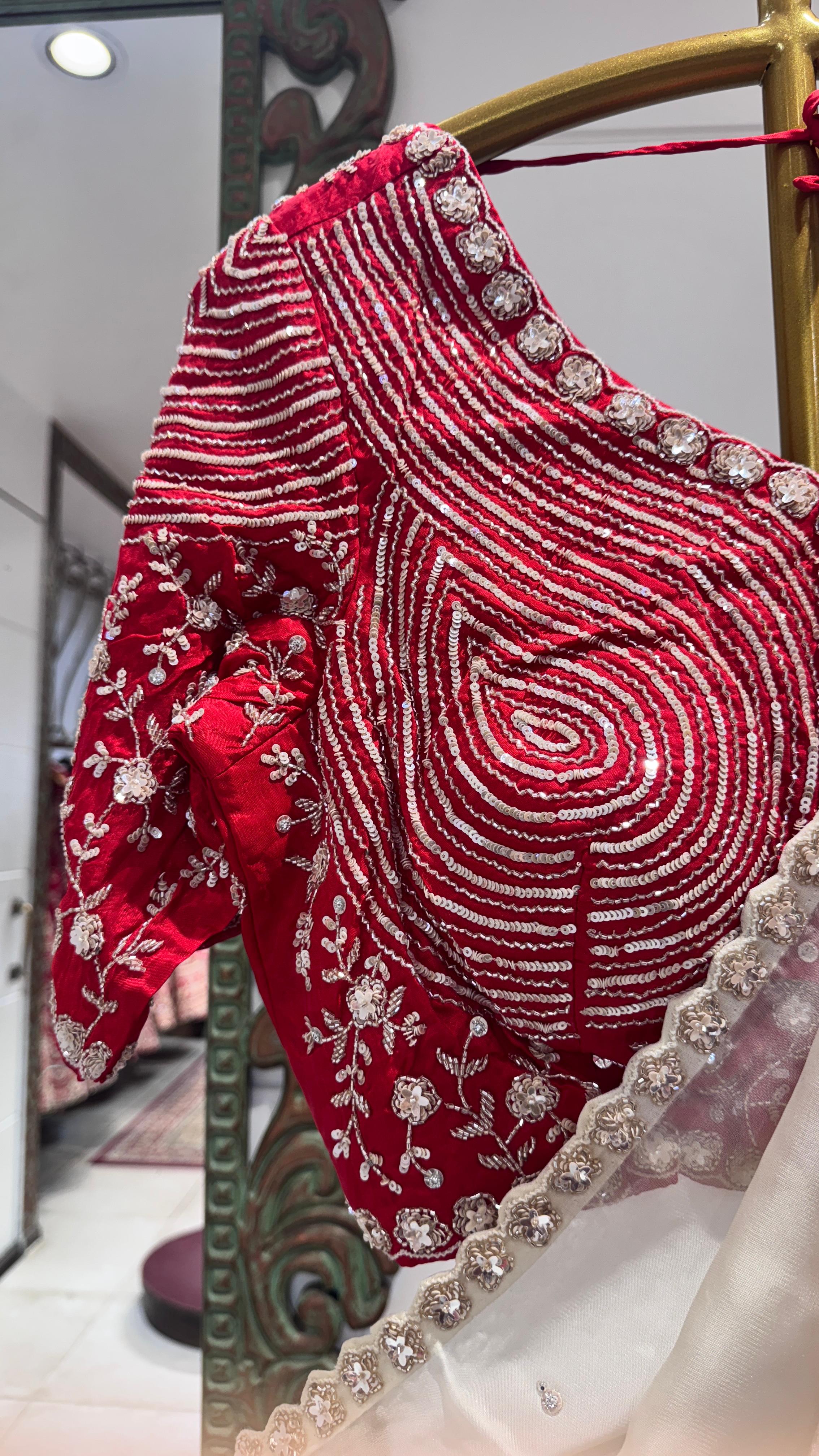Red saree with floral border