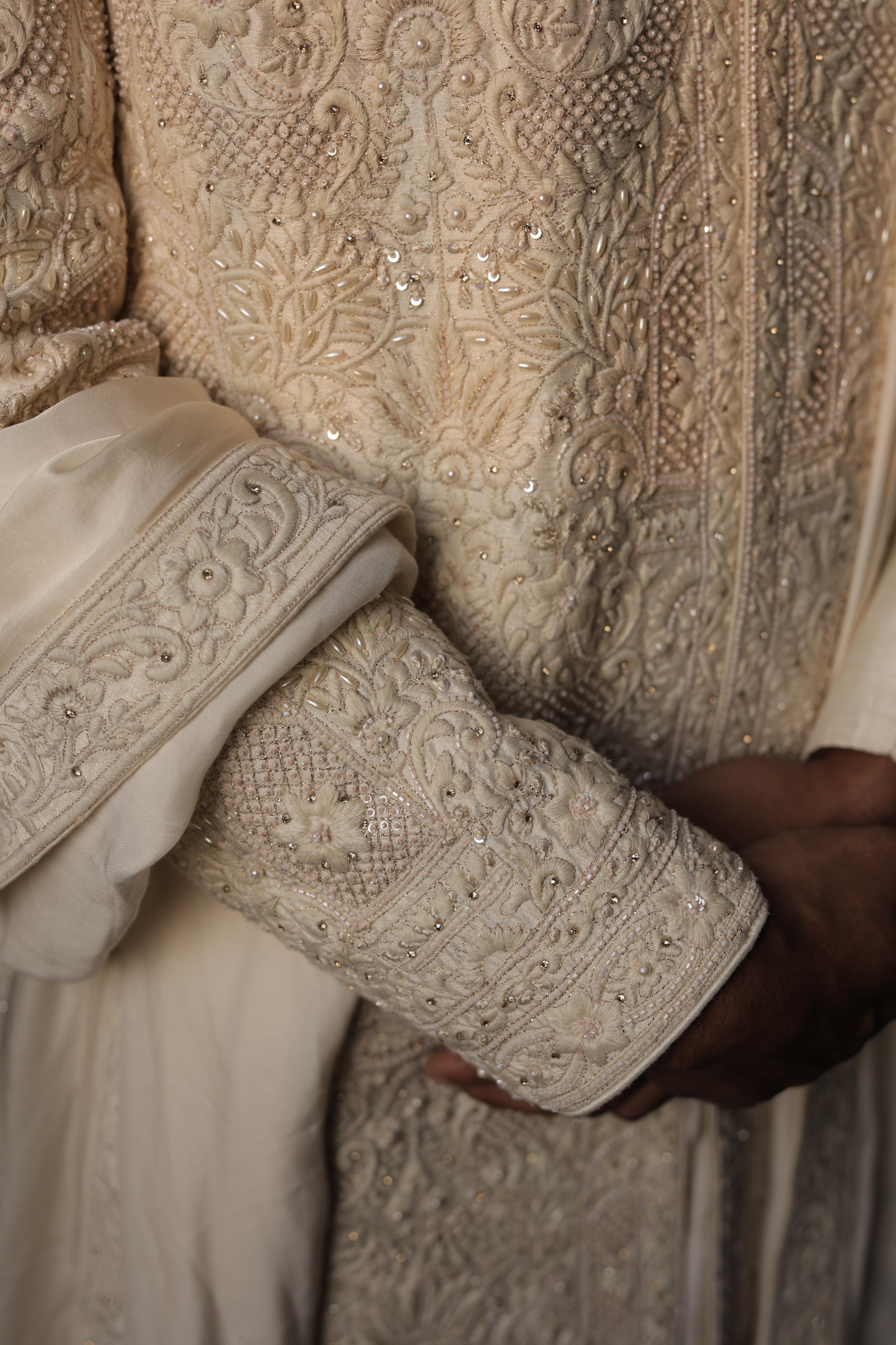 Ivory silk sherwani with intricate embroidery