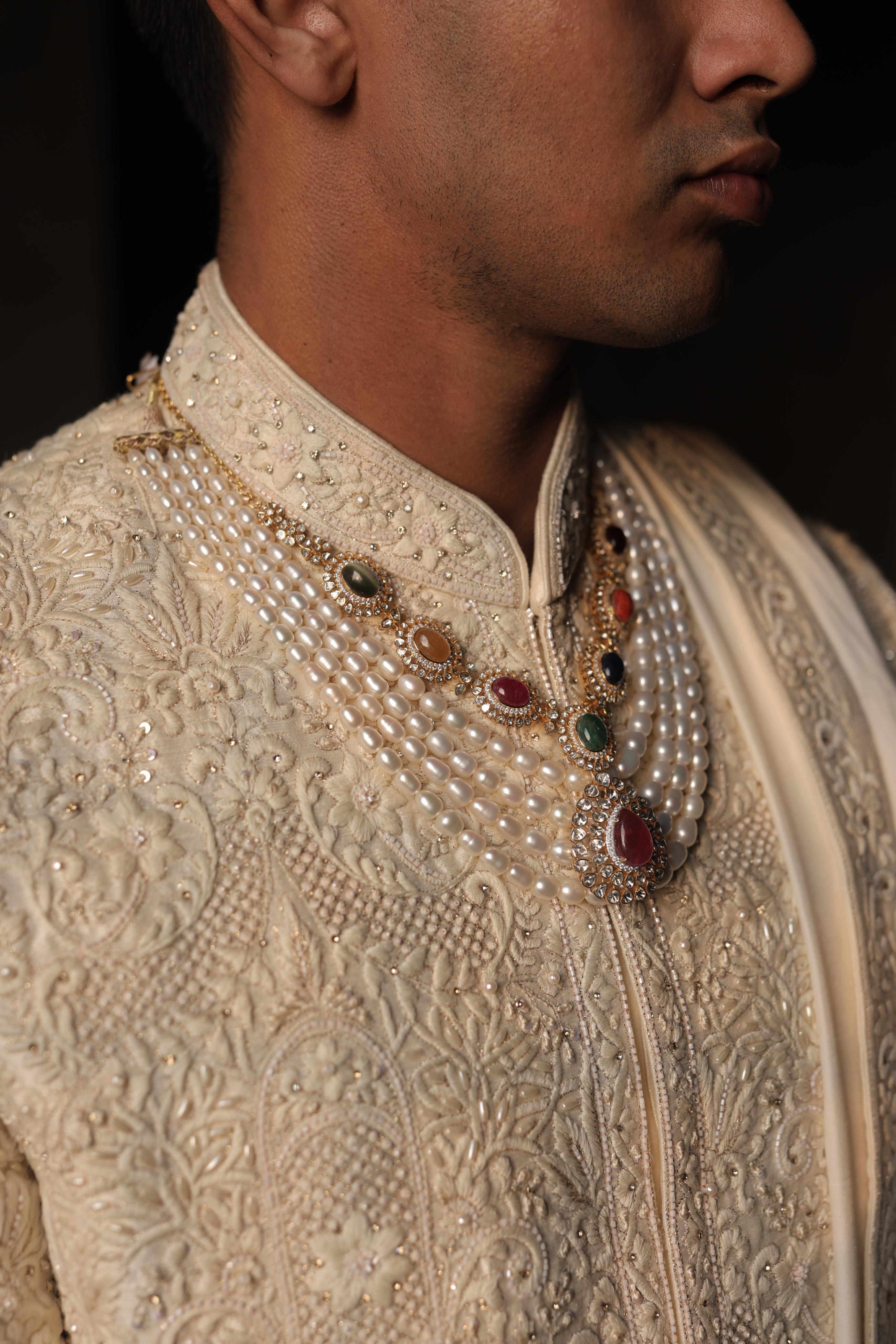 Ivory silk sherwani with intricate embroidery