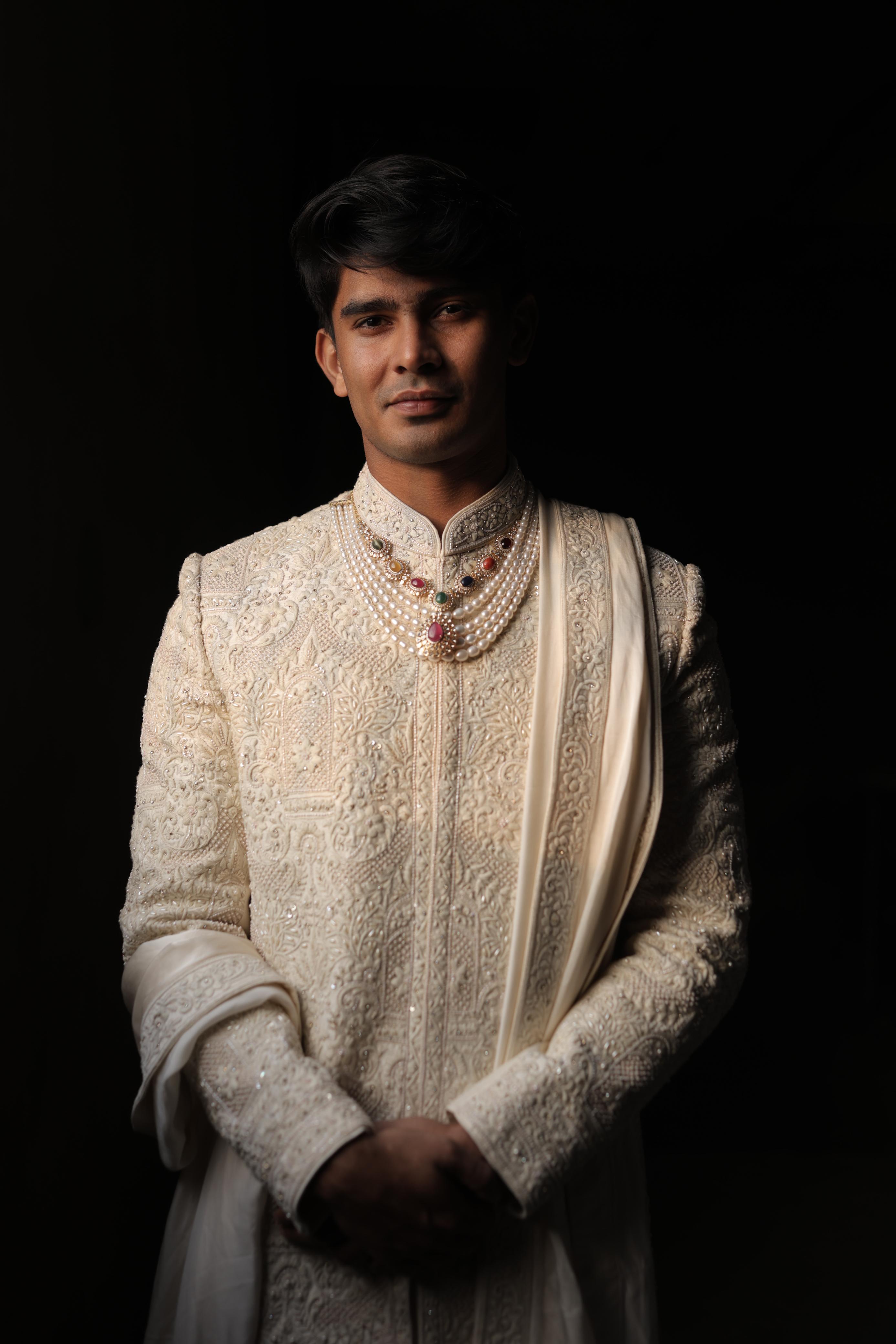 Ivory silk sherwani with intricate embroidery