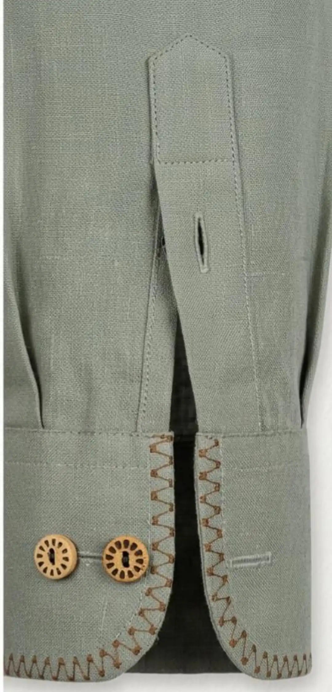 Sage green linen hand-painted shirt with signature leopard & tropical leaf artwork on chest