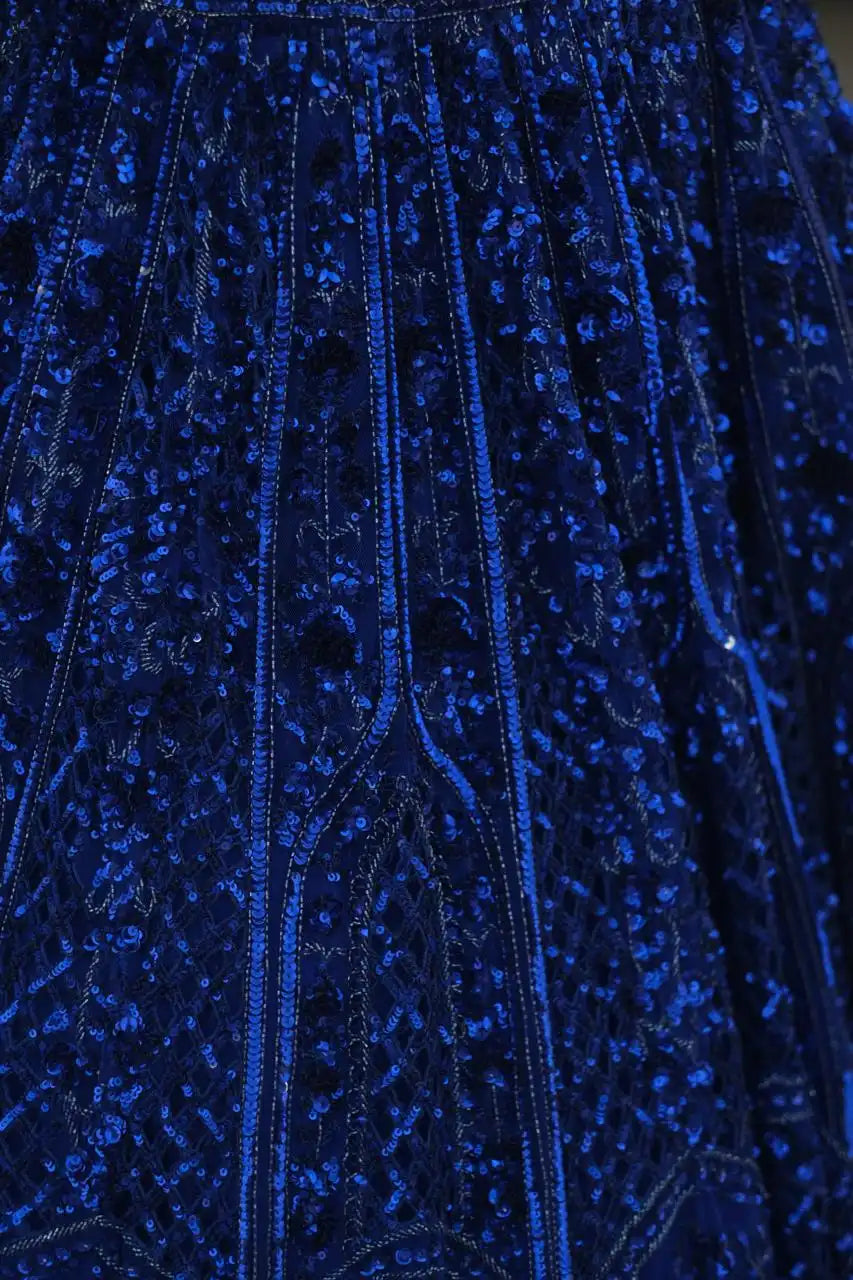 Royal blue net lehenga with floral embellishments