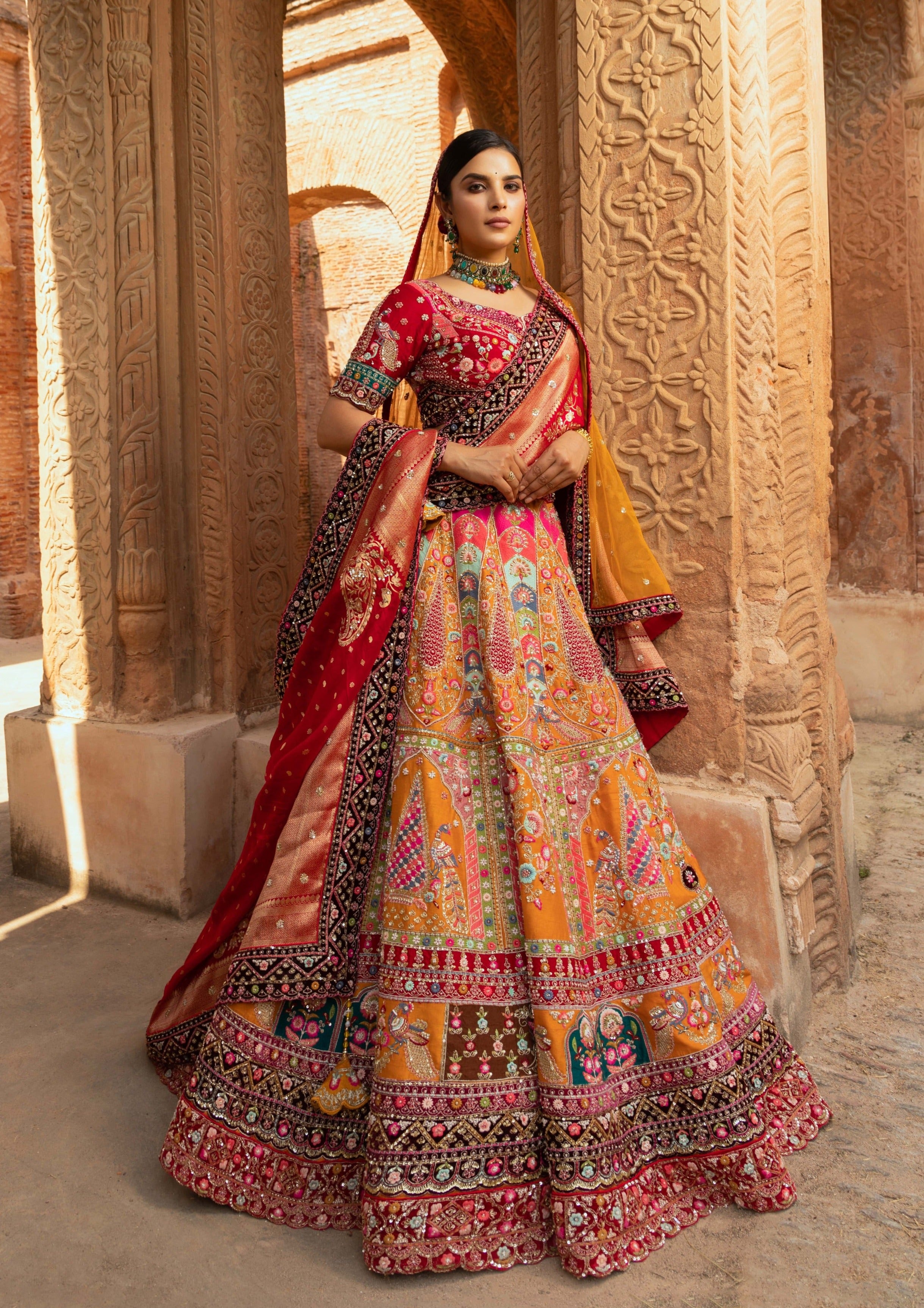 Yellow multi coloured zardozi bridal lehanga