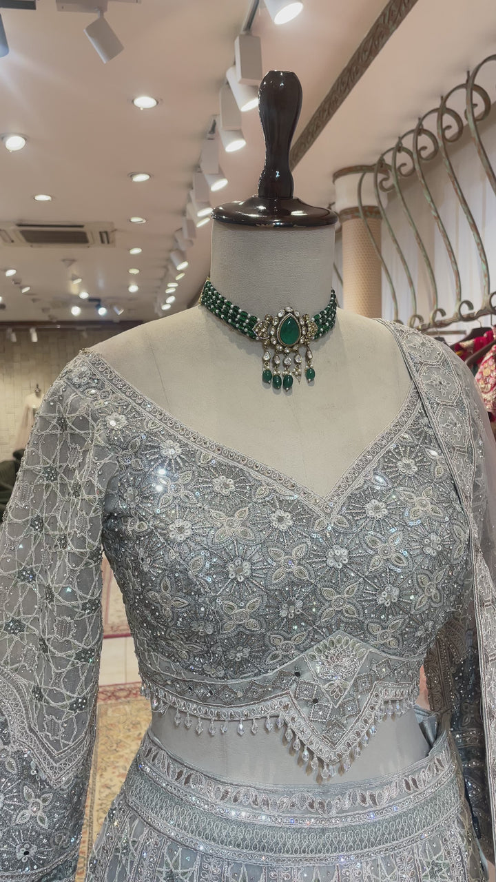 Grey net lehenga with sequin embellishments