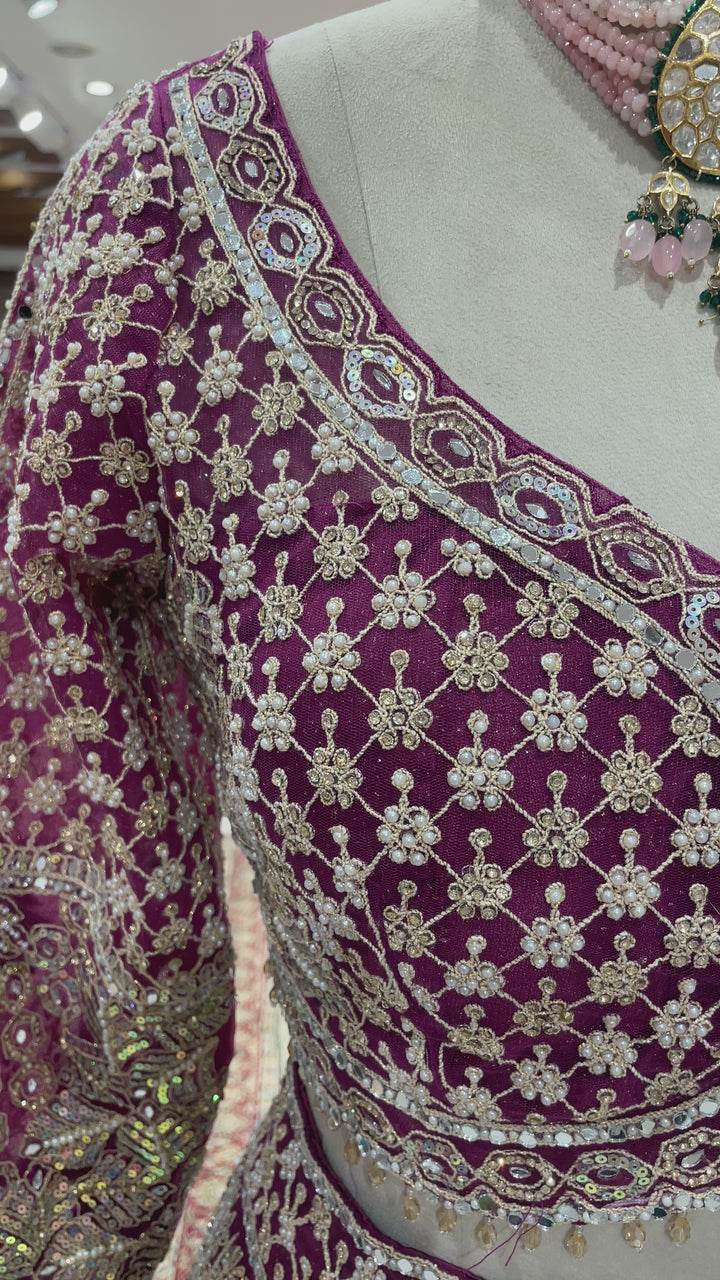 Wine colour lehenga with gold and silver sequence work