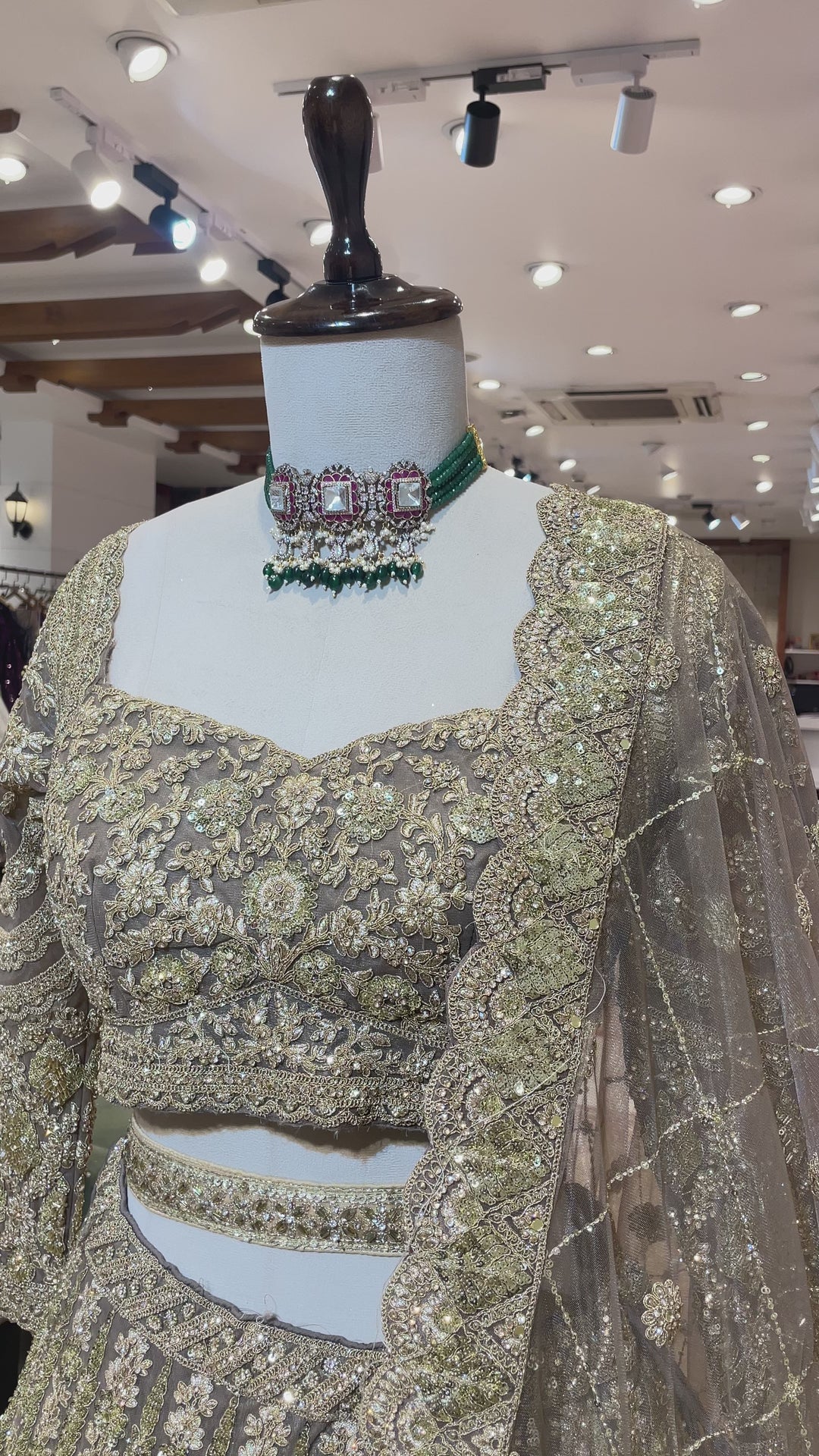 Net lehenga with gold embellishments