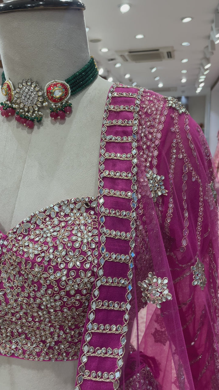 Pink silk lehenga with mirrorwork