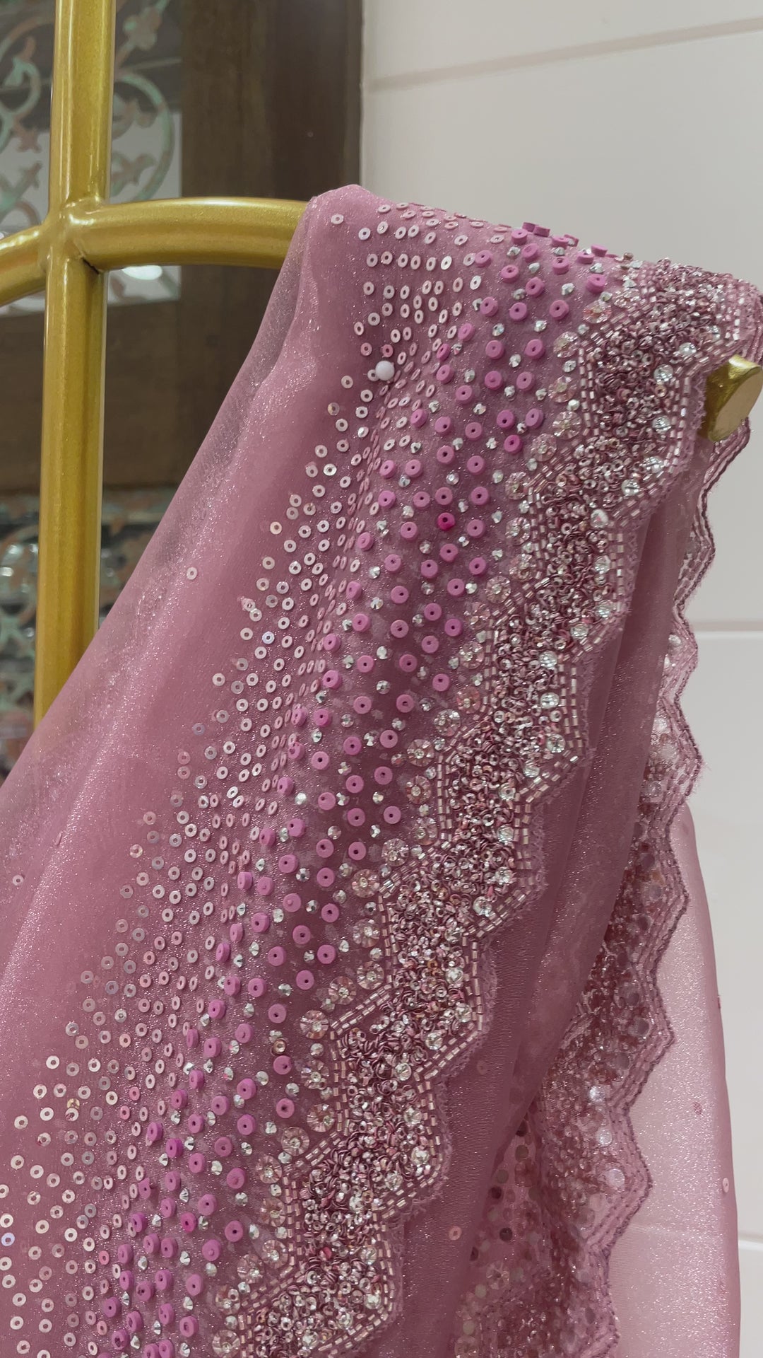 Pink tissue organza saree with sequin and cutdana embellishments