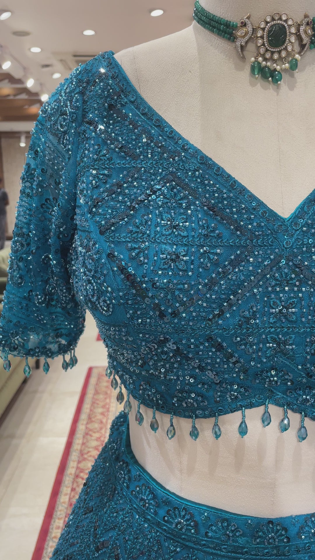 Teal blue Lehenga with sequins work