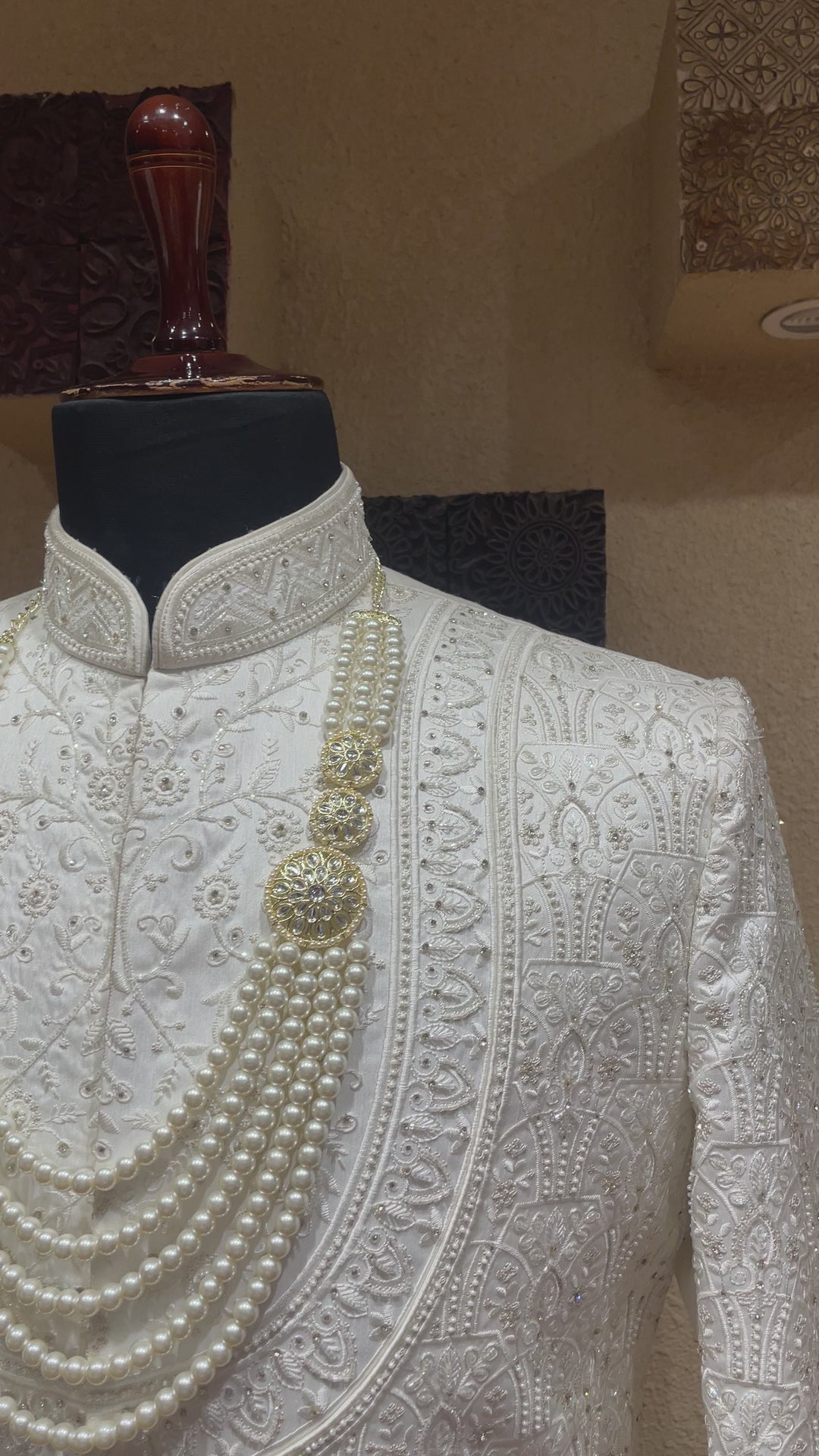 Ivory silk sherwani with threadwork and embellishments