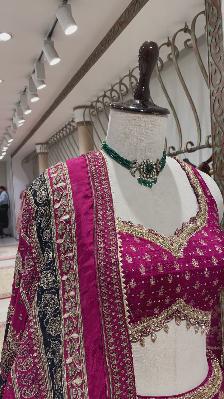 Magenta Banarasi silk lehenga with motifs