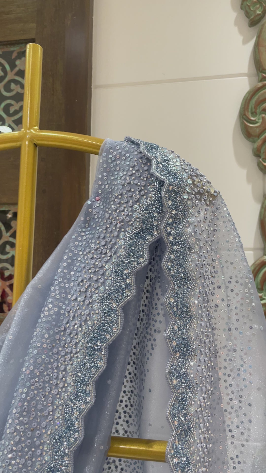 Blue tissue organza saree with sequin embellishments