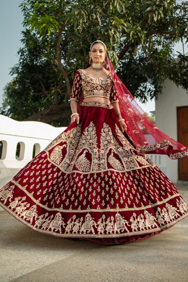 Traditional elephant motifs red lehenga by Creative Stylista Boutique